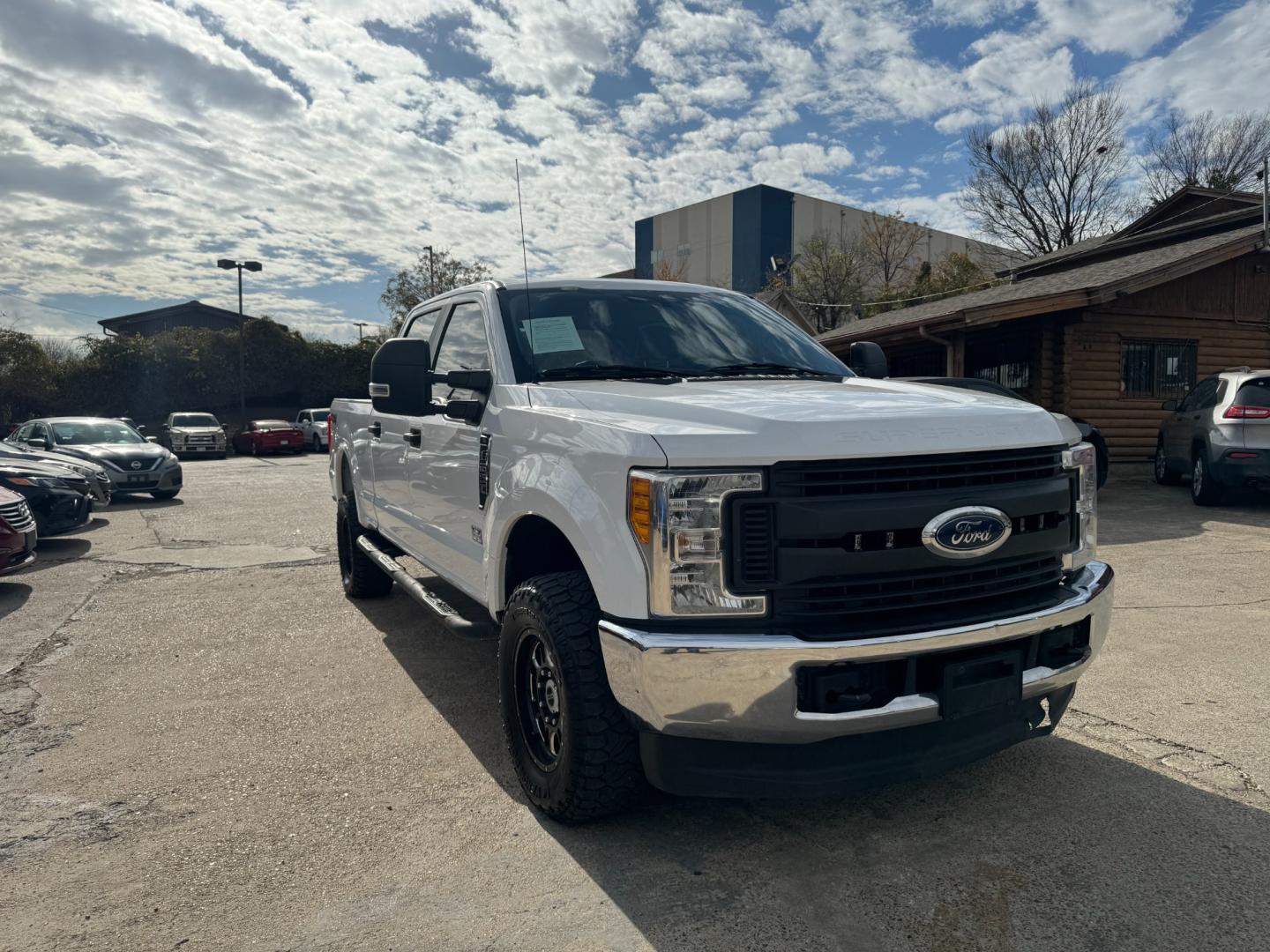 2017 white Ford F-250 SD King Ranch Crew Cab 4WD (1FT7W2B67HE) with an 6.2L V8 OHV 16V engine, 6A transmission, located at 945 E. Jefferson Blvd, Dallas, TX, 75203, (214) 943-7777, 32.752514, -96.811630 - Photo#1